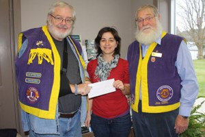 Westport Lions Club Treasurer, Bob Weir, right hands a donation cheque to Leslie Renwick, of Community and Primary Health Care, along with Lion President, John Rempel. It was one of six donations totalling $2150 presented by the club last week. The others are below. The Club also donated funds to Dog Guides, Canadian Diabetes Association, Effective Speaking, Camp Kirk, Children�s Wish Foundation, and Rideau Sewing Club. 