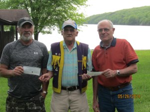 Lion Don Baker, Chairperson of the Westport Lions Spring Cash Draw presented first prize $1500 to Harry Beckett and third prize $250 to Bernie MacLean, both of Westport and second prize $500 to Edward James of Ottawa who was not available.